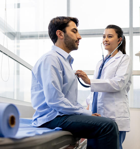 female physician examining her patient