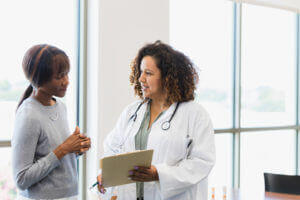 women's health doctor talking to patient