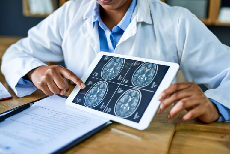 Neurologist Explaining report to patient