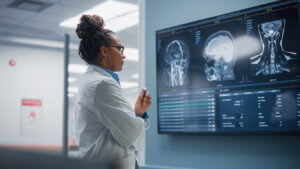 Confident Black Female Neurologist Analysing Patient Report